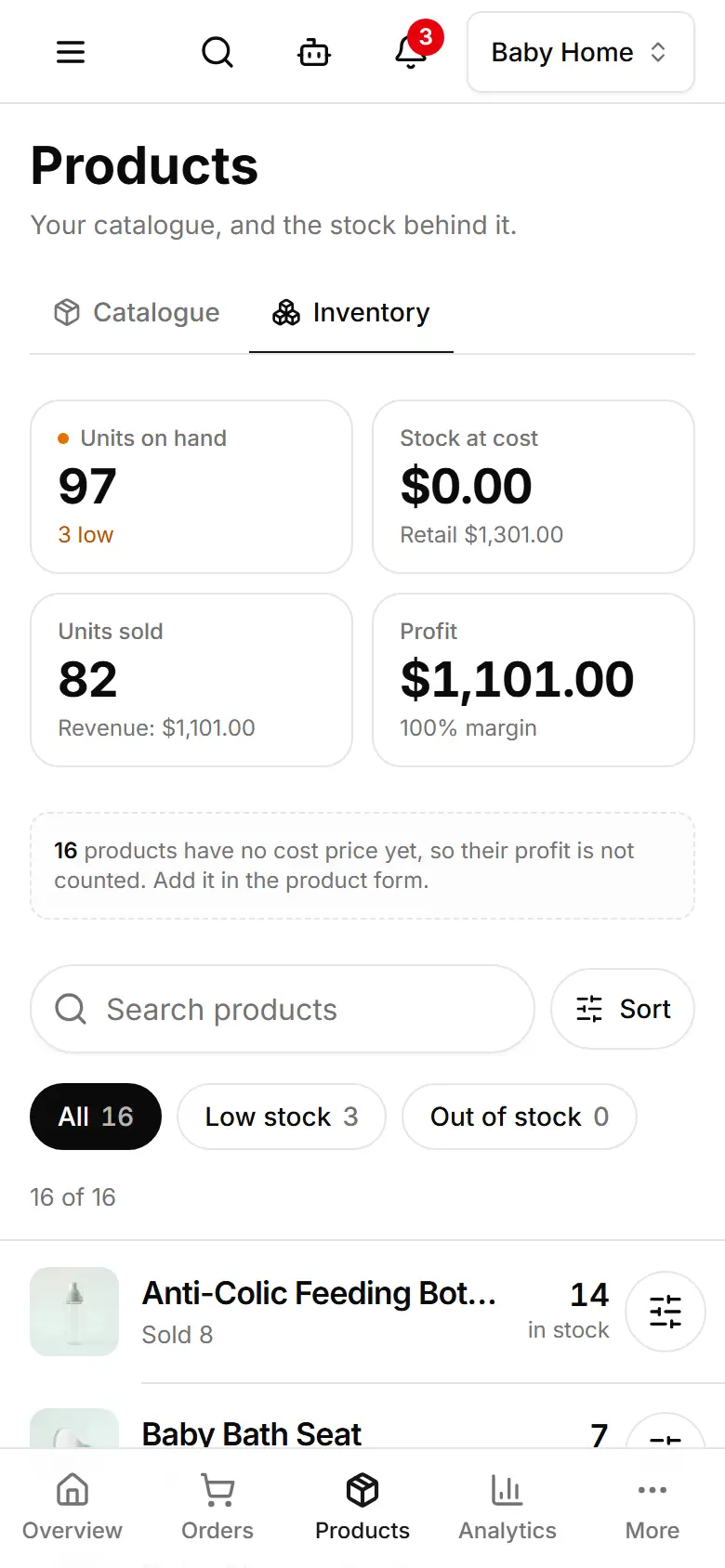 Stock at cost, the Low stock and Out of stock chips, and an adjust button on every row.